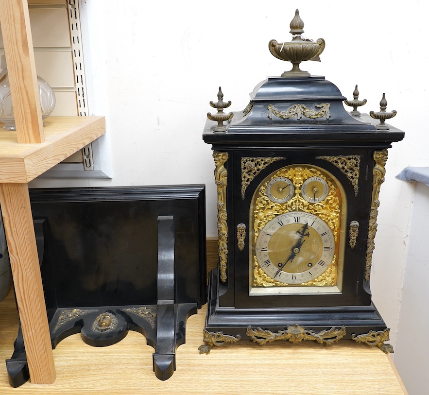 A large Edwardian ebonised mahogany and ormolu mounted bracket clock and bracket, movement by W&H Sch., striking on two coiled gongs, dial signed J. Lewis, Margate and Ramsgate, 71cm high. Condition fair to good, the clo